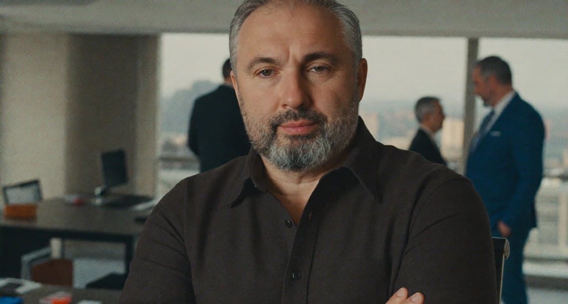 Alex Yanovsky in an office