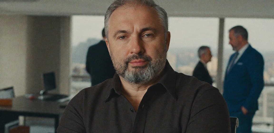 Alex Yanovsky in an office